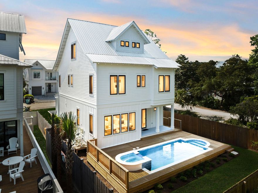 Discover coastal elegance in this stunning newly constructed home at 144 Dalton Drive, offering a perfect blend of luxury, comfort, and prime location. Just a short stroll from the Eastern Lake Beach Access, this home is equally poised as a great vacation rental or second home/primary. Inside, over 3,200 square feet of thoughtfully designed living space await, featuring 5 spacious bedroom suites--each with its own private ensuite bath--plus a convenient first-floor half bath for guests. The open-concept layout is ideal for both entertaining and everyday living, with seamless transitions between the gourmet kitchen, dining, and living areas. The chef's kitchen is a showstopper, boasting professional Cafe series appliances, a 6-burner gas range, double dishwashers, a freestanding ice maker, and a striking blue backsplash that adds a fun, coastal touch. The inviting living room extends effortlessly to a resort-style outdoor oasis, boasting one of the largest pools on the street. Step onto the covered back porch, take a refreshing dip in the private pool, or unwind in the spa. With plenty of space for dining and lounging, this outdoor retreat is perfect for enjoying warm Florida evenings under the stars. Whether you're looking for a full-time residence, vacation home, or investment property, 144 Dalton Drive delivers luxury and convenience in one of 30A's most desirable locations. Don't miss this opportunity to own a brand-new coastal haven.