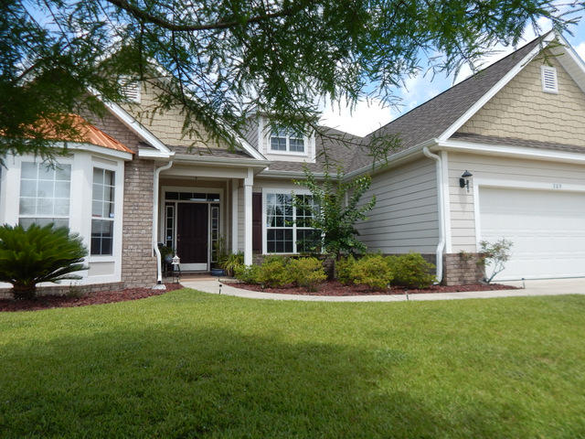 This beautiful, One owner, Craftsman style home has many upgrades and features. Inside you will find 4 bedrooms and 3 bathrooms laid out in a '' split bedroom'' floor plan. The home is in great condition, extremely clean and open and spacious. There is a lot of natural light, vaulted ceilings, trayed ceilings, recessed lighting, tiled floors and back splash, solid surface counter tops, a large welcoming foyer, a formal dining room and a breakfast room. The kitchen comes with stainless steel appliances, tiled floors, a pantry, vaulted ceilings and much more. All four bedrooms are good sized and the master bedroom has a sitting area along with trayed ceilings and plenty of natural light. The master bathroom has a walk- in shower, walk-in closet, soaking tub, double vanities and tile floors.