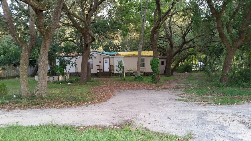 Great building lot in the heart of FT Walton Beach, convenient to Eglin AFB, Hurlburt Field and FT Walton Beach Medical Center. New homes in area. Lot is zoned MU (Mixed Use), uses include single family and multi-family residential. See Land Development Code in documents. Utilities including gas are available to the lot. Water tap already paid. Mobile home has no value and being conveyed ''as is''. Additional lots for sale at 203 Bob Sikes Blvd and 741 Green Street. This location is close to schools and short drive to Wal-Mart, Sam's and Lowe's. You could be on Okaloosa Island and at the beach in about 15 minutes. Don't miss this opportunity, lots are getting hard to find.