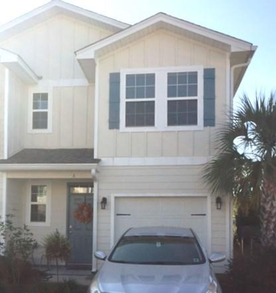 Unique location for this two year old 3 bedroom, 2 and a half bath townhome in Santa Rosa Beach. Close to Walmart, Publix, Grand Boulevard, Sacred Heart Hospital and the white sandy beaches. End unit has stainless steel appliances, granite countertops, and wall to wall tile flooring downstairs. Half bath downstairs and two full baths upstairs. Master has walk in closet and en suite bath with walk in shower. Two other rooms are large and share the hall full bath. Upstairs laundry area means no more dragging baskets up and down stairs! One car garage with automatic garage door opener. Association takes care of lawn maintenance. Available December 27 for $1600/month. Owner will consider a dog up to 40 pounds that is spayed or neutered and fully housebroken with a $255 non refundable pet fee.