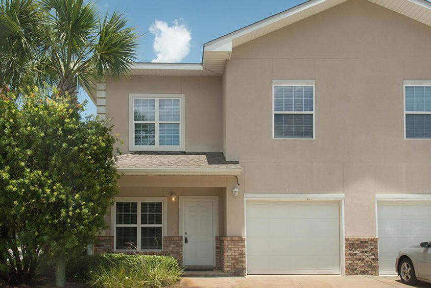 LOCATION LOCATION LOCATION! Right outside back gate of Hurlburt Field and within minutes of Eglin AFB. Unique END unit with 3 bedrooms upstairs with large loft area overlooking the living room and a dining room. All tile downstairs.  Kitchen has granite counter tops, stainless steel appliances and small island.  One car garage and 2 dedicated parking spaces in front of unit. Lawn maintenance  is provided by HOA.  HVAC just replaced last month! All information is believed to be accurate but should be verified.