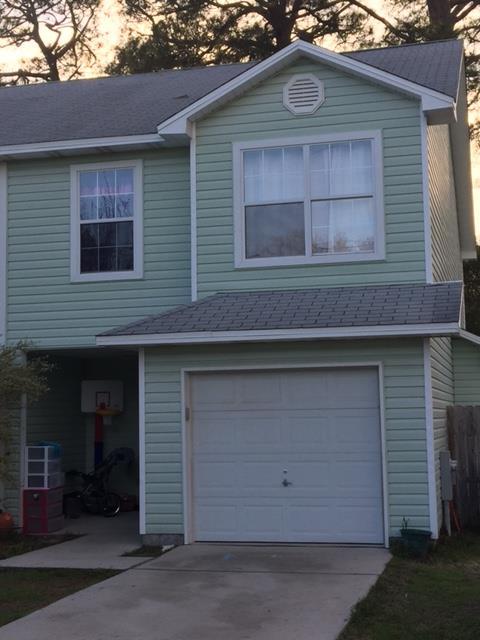 Fantastic buy with a great location! Close to shopping, restaurants, Eglin AFB, and Hurlburt Field. Also located within 10 minutes to the beach. This townhome has been freshly painted and new carpeting is scheduled to be installed in first week of March. Master bedroom is oversized and comes with a large walk-in closet. Master bathroom features a double sink vanity. The backyard is fully privacy fenced and comes with an open patio great for grilling and entertaining! As well as a 1-car garage, home also comes with extra parking on the side.
