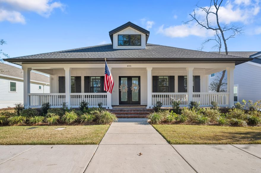 Southern charm meets modern elegance in this beautifully designed 4 bedroom, 3 bath home in the coveted Deer Moss Creek community of Niceville. Located at 405 Sweetgrass Lane, this 2,546 square foot residence offers refined interiors, thoughtful details, and timeless curb appeal.Oversized double glass doors open into a spacious, light-filled floor plan with luxury vinyl plank flooring throughout. The living room features an electric fireplace and wallpapered feature wall that adds warmth and style. A dedicated dining space invites entertaining with effortless flow to the oversized kitchen island and seating area. The kitchen is wrapped in ceiling-height cabinetry with crown molding, quartz countertops, and a walk-in pantry with custom wood shelving. The primary suite is a retreat of its own, featuring a wallpapered accent wall, ceiling detail, and access to a spa-inspired bath with soaking tub, glass-enclosed tile shower, private water closet, and walk-in closet with built-in wood shelving. Three additional bedrooms include one with its own en-suite bath, and two connected by a Jack-and-Jill bath.
Plantation shutters on every impact rated window add both privacy and elegance. The exterior is low maintenance and includes permanent outdoor Christmas lighting for year-round convenience. A spacious 2-car garage completes the home's functional appeal.
Set within Deer Moss Creek, residents enjoy resort-style amenities: a pool, clubhouse, half basketball court, gazebo, sidewalks, and over five miles of paved walking trails.