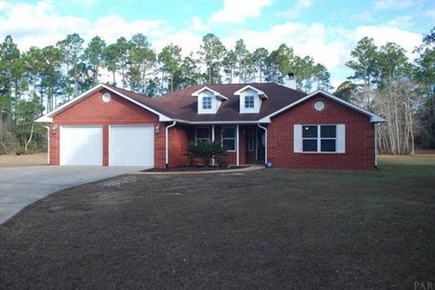 OVER 1.5 ACRES IN A GREAT NEIGHBORHOOD IN NAVARRE. RARE FIND IN SOUTH SANTA ROSA COUNTY WITH HORSES ALLOWED, BEAUTIFULLY MAINTAINED & UPDATED 4BD/2BATH ALL BRICK HOME WITH NICE BARN W/ STALLS. SPLIT DESIGN HOME, HIGH CEILINGS, WHIRLPOOL IN GORGEOUS M/BATH SEPARATE TILED SHOWER, UPDATED KITCHEN W/ CUSTOM DESIGNED CABINETS, TILE AND WOOD FLOORS THOUGH OUT AND MORE JUST MINUTES FROM SCHOOL, BEACHES, SHOPPING, AND MILITARY BASES.