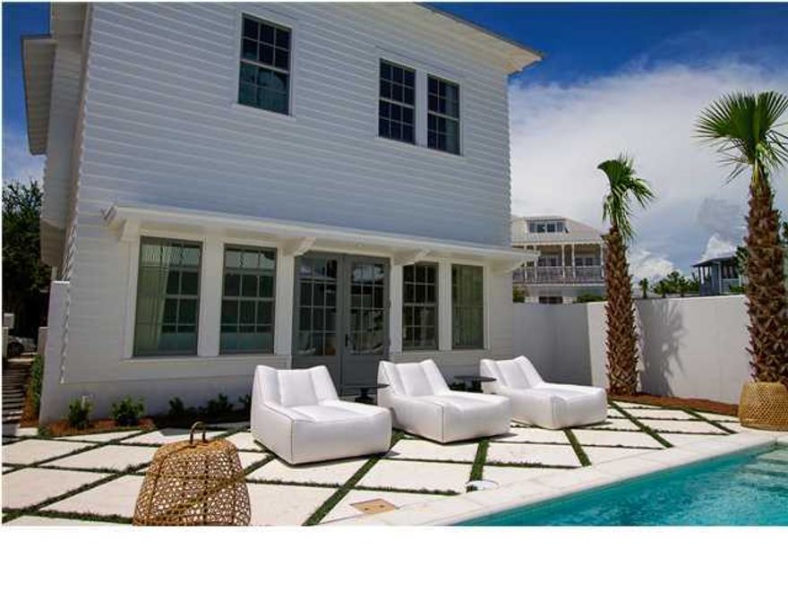 Welcome to ''The Cottages At Rosemary Beach'' by Benecki Homes of Atlanta, GA and designed by Lew Oliver, Inc. These firms have to their credit an extensive portofolio of exceptional homes, including most recently, the Coastal Living 2012 Showhouse in Rosemary Beach. Exquisite attention to both detail and quality of finish is readily apparent. There are entry walls of silky Venetian plaster, floors of select hardwoods and Peacock Pavers, Calcutta marble bathrooms, 1x8 wood walls in main living areas and custom wood cabinetry in kitchen and baths. The plumbing fixtures and faucets are top of the line Kohler and the kitchen is replete with Thermador refrigerator and range and dual Bosch dishwashers. There are three generously proportioned bedrooms with private bath and a bunk room