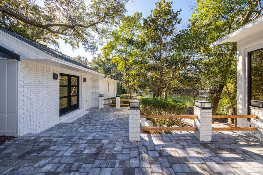 New effective year built of 2020! Experience the pinnacle of waterfront living in this completely renovated home, where no detail has been overlooked. A rare gem nestled high above the picturesque Chula Vista Bayou--this charming and spacious home offers the perfect blend of waterfront tranquility and modern convenience. Set on nearly an acre lot, this residence boasts 150 feet of protected deep-water frontage.The split-level design is thoughtfully laid out to maximize natural light and livability, featuring four generously sized bedrooms, a dedicated office, and multiple living areas. The sprawling master suite is a true sanctuary offering stunning views of the Bayou, courtyard access, and a master bathroom that feels like a luxurious spa. Complete with his-and-hers closets, a large tub with water views, and a walk-in shower, it's the ultimate retreat.
Every detail of this home is designed for comfort and convenience 
featuring brand-new electrical, plumbing, HVAC, roof, seawall, and dock. This property is ready to provide peace of mind and modern comfort. Enjoy the luxury of deep-water intracoastal access ideal for boating and water sports, all from your own backyard.
Located in the highly desirable X flood zone, this home offers the rare combination of waterfront living without the added expense of flood insurance.
Whether you're soaking in the serene waterfront views or enjoying the spacious interiors, this property offers a lifestyle like no other.
Schedule your private showing today and experience the unparalleled charm and elegance of this exceptional Bayou home!