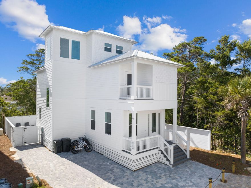 This fully furnished home is built to maximize rental income returns. Tucked away on a dead-end street with NO HOA DUES, you are just a short stroll away from the beach access and Gulf Place Town Center offering several restaurants and shopping venues. Three of the bedrooms offer their own private full bath. The main level of the home is geared around entertaining, with an open concept flowing from the living area through the kitchen, with access to the private pool area. There is a bonus space which includes custom built-in bunks, along with a half bath on the main level. On the second level, you will find the master and two guest rooms, each offering a private full bath. On the 3rd level you will find another large bonus area, which is configured for additional sleeping space. The interior finishes include LVP flooring, quartz countertops, stainless steel appliances, shaker cabinets, tiled showers and shiplap accent walls. Outside you will enjoy a private heated pool, outdoor cooking area and a paver driveway. 

Located in the Gulf Place area, you'll find everything you need within a short walk. Indulge in delicious meals at Shunk Gulley, savor a cup of coffee at Sunrise Coffee, enjoy a refreshing beer at Growler Garage, treat your family to pizza at Pizza By The Sea, and satisfy your sweet tooth with ice cream from Pecan Jacks. The designated beach access, Ed Walline Public beach access, is just a 5-minute walk or a quick drive away, offering parking, bathrooms, and showers.
