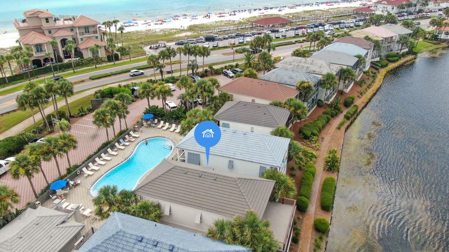 With too many upgrades to list & rental projections above $140k/year, this poolside/lakefront/& Gulf-view renovated retreat is furnished & a true standout among the Destiny Beach Villas. impact-rated windows/doors, plantation shutters on doors/windows, custom soft-close Kraftmaid cabinetry & quartz counters in all 4 bathrooms & both kitchens, streak-free coated & frameless glass shower doors over custom tile/quartz showers, extended rear decks w/ Azek decking/railing, stainless appliances, gas ranges, tankless Rinnai water heater, upgraded lighting, sound barrier below tile flooring between levels & on stairs, remote-accessible entry doors/alarm system/and AC thermostat, and the list goes on! A rare find in it's condition, this immaculate gem is not one you want to miss! Call today!