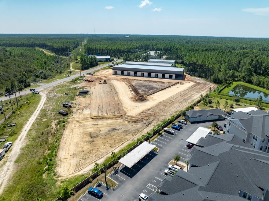 ~5,200 square feet of a total ~25,430 square foot freestanding building in St. Joe's South Walton Commerce Park of the flourishing Santa Rosa Beach, Florida market.  This 5,200 square foot space also offers a large roll-up door for convenient logistics and receiving.  St. Joe's Watersound Origins and 'Bay-Walton Sector Plan' involves 20,000+ rooftops of residential density in proximity to this new development and space.  The site plan is uploaded to this listing.  This subject new development project involves Walton County, Florida parcels: 05-3S-18-16010-000-0050 AND 05-3S-18-16010-000-0060.  Occupancy should be achievable by October 1, 2025.