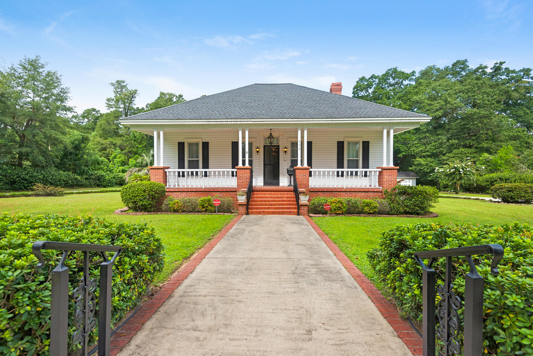 Beautiful Historic 3 bedroom 2 bath home located in the heart of Defuniak Springs...just 5 blocks away from Lake Defuniak. This home sits on 2.38 Acres and has been kept in pristine condition for its age. Lovely covered front porch to enjoy the summer breezes. The circle driveway with a spacious 2 car attached carport in the back. You have to see this home in person to appreciate the historical charm and elegance.