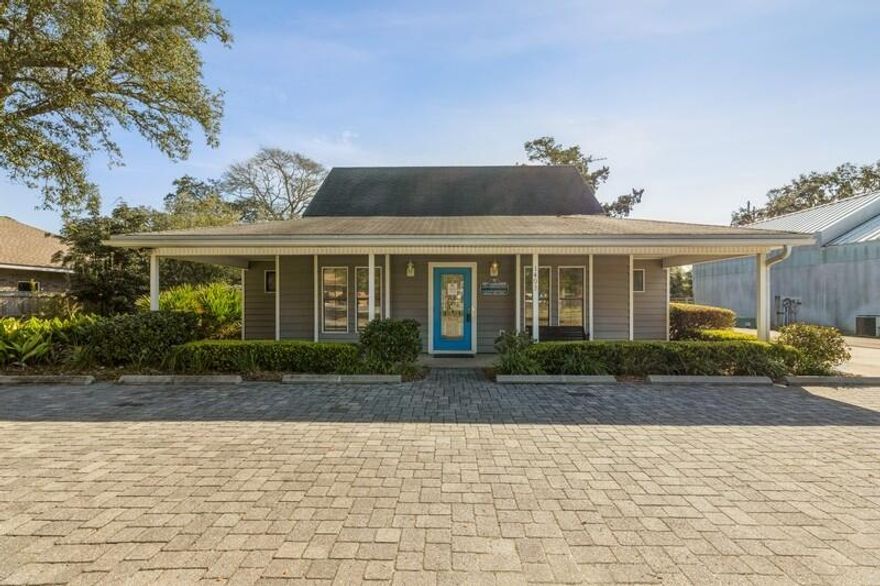 Pristine office - medical - dental - retail space with great visibility - Just off of Hwy 20 in east Niceville and just before Hwy 293 access to Destin and all points north.  Property is over half an acre with plenty of undeveloped space to make additions and modifications to the existing office.  At nearly 2,700 square feet, the current building has been functioning as a doctor's office and features 7 exam rooms, 2 waiting areas, large reception area, break room and numerous bathrooms.  In addition, there is an attached living quarters with a master bedroom and bath, kitchen/living area combo and a couple of small bed/storage rooms.  Exterior is hardie board siding for easy maintenance - large parking area - well landscaped and professionally maintained.  Turn key location!