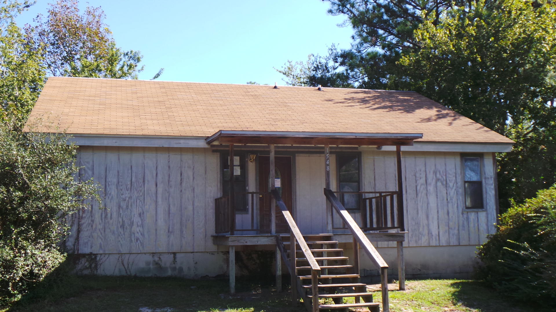 Unique property in quiet area! LARGE home with and fun layout available now in Gulf Breeze. There is great potential here! Home has awesome outdoor areas featuring upper level open deck, lower level decking, and nice sized front porch. Convenient to PSC . Walk to the bay! Don't miss out on this great property.