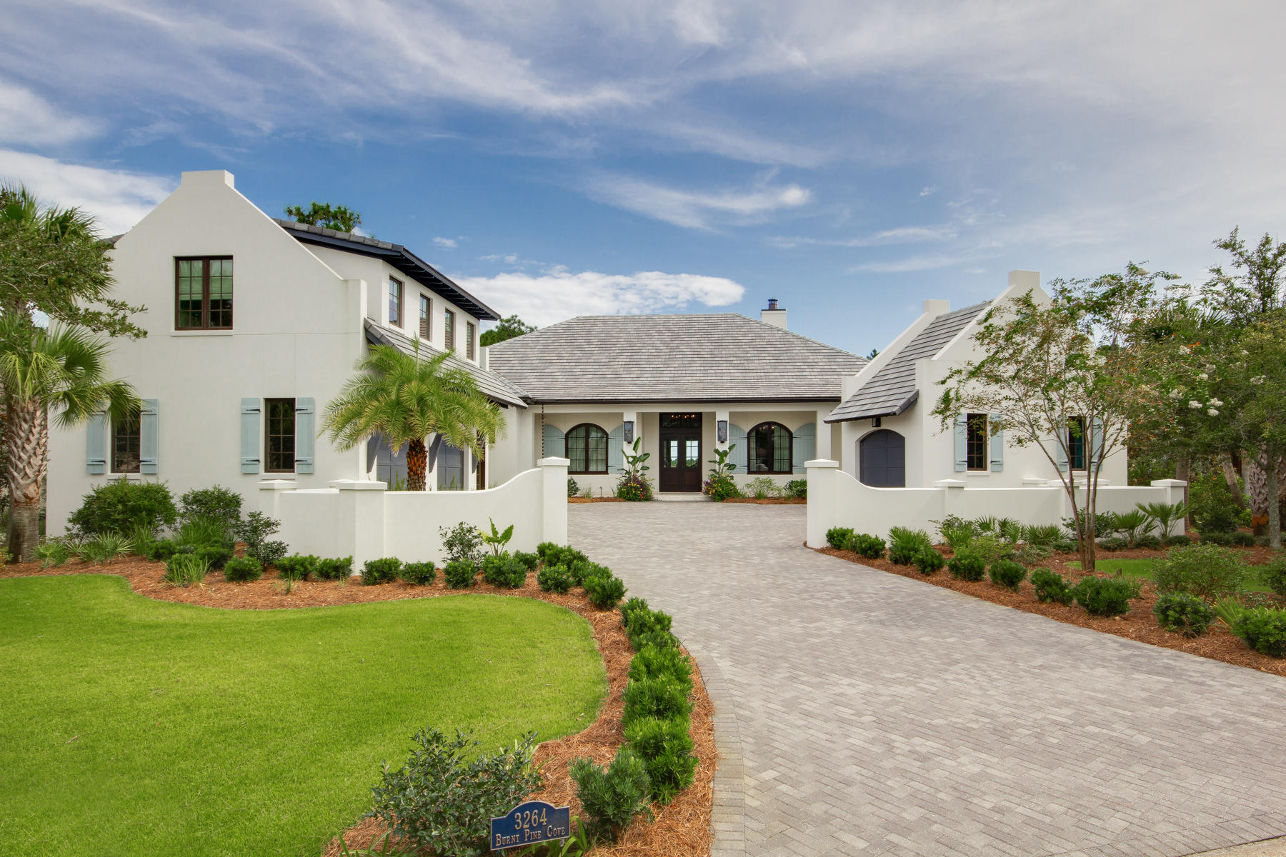 Modern touches of Pecky Cypress wood, Quartzite countertops, Coral Stone terraces and Marble accents create this Bermudan-style home. Built in the exclusive Burnt Pine Community within Sandestin Golf and Beach Resort, this home has beautiful curb appeal and a coastal elegance that is unlike any other home in the community.Spend your time hosting and entertaining in the gourmet kitchen space with custom cypress cabinetry, a Wolf range, Sub-Zero fridge and quartzite countertops. Hang out in the family room with a wet bar, raised Pecky Cypress beamed ceilings and a beautiful stone fireplace. Lounge poolside in your private heated saltwater pool and outdoor entertainment area with summer kitchen and grill overlooking the green and the fairway of the beautiful 16th hole of the golf course.