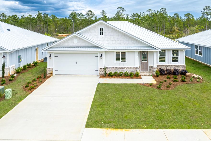 NEW CONSTRUCTION 3 bedroom, 2 bath 1,719 Sq Ft resort style home in the prestigious, gated community of Bear Creek! Nestled on a prime lot overlooking the landscaped lake and serene green space. This home is steps from the newest amenity center . Bear Creek residents enjoy amenities including pickleball, tennis, basketball courts, a fitness center, and a resort-style pool. Construction has begun on the second pool and four more pickleball courts. Bear Creek is minutes from the Beaches of South Walton and parks. Home is scheduled for completion the week of 3-17 with Kitchen Aid appliances.