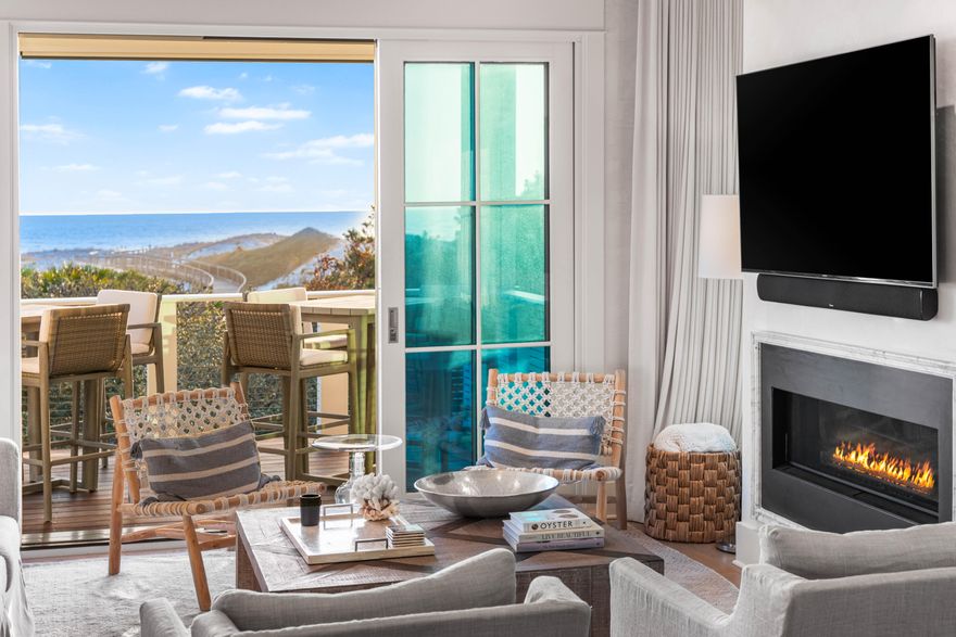 Draped amongst the stunning dunescape of WaterSound Beach, discover an exquisite gulf front masterpiece at 101 S Founder Lane offering timeless elegance and unmatched luxury. Expertly crafted by Regal Stephens with sophisticated design by Tracery Interiors, this 6-bedroom, 6.5-bathroom residence, complete with a private pool, 2-car garage, and office/flex room, offers a rare blend of refined craftsmanship and stunning coastal views. Sold fully furnished and never rented, this exceptional property is positioned on a quiet cul-de-sac, providing privacy and direct access to the beach via community boardwalk.Step through the entry, where herringbone-laid hardwood floors and Venetian plaster walls set a tone of understated luxury. This level includes three spacious bedrooms, each with private ensuite bathrooms, and a well-appointed laundry room featuring dual Electrolux washer/dryers. An elevator provides seamless access to all floors. Outside, relax by the saltwater heated pool sheltered by the dunes, enjoy the summer kitchen with a beverage cooler and ice machine, and take in the serene and private setting.
The heart of this home lies on the second floor, where an open-concept kitchen, dining, and living area showcase breathtaking gulf and dune views. The chef's kitchen is equipped with professional-grade appliances, including a Wolf range, custom hood, and Sub-Zero refrigerator and wine fridge, all set off by marble countertops, a marble waterfall island, and custom cabinetry. A walk-in pantry with a secondary refrigerator enhances convenience. The living room's gas fireplace with a marble surround adds warmth and elegance while a spacious balcony with retractable screens offers a perfect spot to enjoy the view, shaded from the afternoon sun. This level also includes a light-filled office/flex room with closet space, a powder room, a unique guest suite/bunk room with six built-in twin bunks, a queen bed, a living area with a TV, morning bar, and private bathroom, along with a junior master suite featuring an elegant ensuite bathroom.
The entire third floor is dedicated to the magnificent master suite, where panoramic gulf views create an idyllic sanctuary. Custom built-ins including wardrobe drawers and a half wall, a morning bar, and a spacious ensuite bathroom with a steam shower, soaking tub, and washer/dryer, make this a true retreat. The custom closet offers abundant storage and thoughtful design. Crowning this luxurious home is a fourth-level tower with both indoor and outdoor spaces to enjoy. This top-floor retreat features remote-control blinds, a retractable TV, and an open-air balcony with a fire table, offering endless views and the ultimate in relaxation.
The gated WaterSound Beach community is located south of Scenic Highway 30A offering homeowners a rare sense of seclusion yet with easy access to area activities. Amenities include swimming pools, a puttering park, community green spaces, a state-of-the-art fitness center, and private boardwalks to one of the most beautiful mile stretches of coastline in the area. Whether you're seeking a luxurious private retreat or a potentially lucrative investment property, revel in the good life at this one-of-a-kind WaterSound Beach residence.