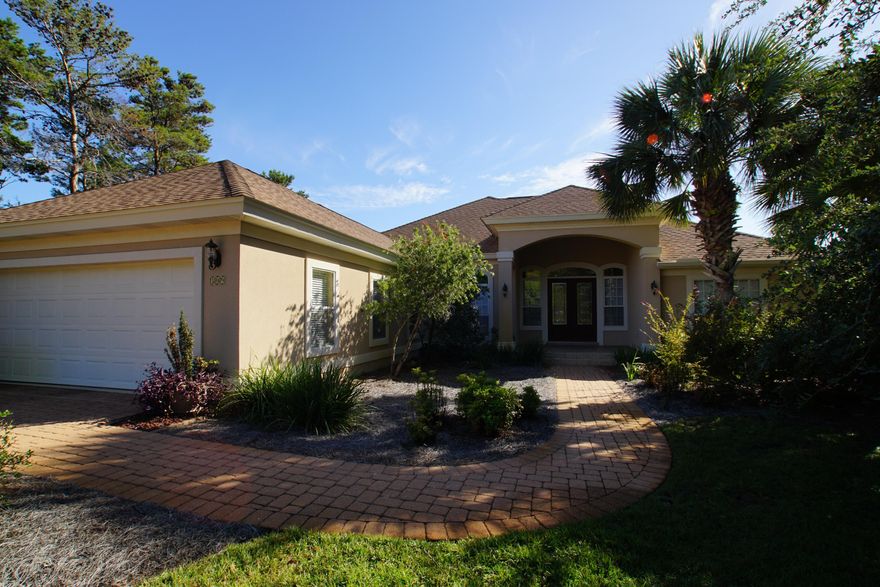 Must see charming residence in the highly sought after neighborhood of Santa Rosa Ridge. This 3 bedroom 3 bath home of a master gardener was built in 2003 with the quality construction of Boswell Builders. Features include a separate office with built in desk and cabinets, spacious kitchen with granite countertops, tiled backsplash and a large breakfast bar for plenty of seating. Master bath includes walk in shower, jetted tub, double vanities, other features include arched doorways, rounded corners, crown molding, 10'11'' ceilings in living, dining and kitchen, 9' foot ceilings in all other rooms, tiled floors throughout except bedrooms, 2.5 car garage, floored attic storage space, pool with screen enclosure, lush landscaping, brick-paved driveway and whole house propane generator!