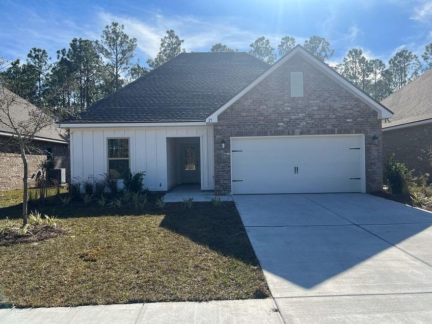 The NOLANA III G in Moonswept at Hammock Bay community offers a 3 bedroom, 2 full bathroom, open design.  Upgrades added (list attached).  Features: double vanity, garden tub, separate custom tiled shower with frameless door, and walk-in closet in the master suite, covered rear patio, recessed lighting, crown molding, kitchen island, walk-in pantry, undermount sinks, framed mirrors, smoke/carbon monoxide detectors, landscaping package, architectural 30-year shingles, flood lights, and more!Energy Efficient Features: water heater, kitchen appliance package, vinyl low E windows, and more!