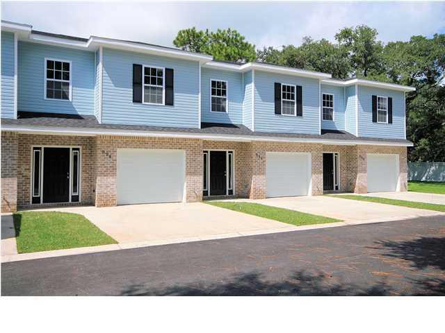 4 bedroom 2.5 bathroom townhome is a rare find. Brick and vinyl exterior, attractive entry way with coordinating shutters, 9' ceilings, spacious foyer and hallway, tile flooring throughout first floor and in all bathrooms. New carpet being installed September 6th. Newly painted. Kitchen is appointed with lots of beautiful cabinetry, granite counter tops, silver mist appliances, pantry and breakfast bar. Spacious open concept feel as Living/Dining room open to kitchen. Single French door off living room leads to open patio. 4 bedrooms to accommodate your lifestyle, ceiling fans throughout, knockdown finish on walls and ceiling. Washer and dryer hookups. Photos are from 2013. New photos coming soon.