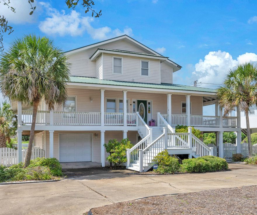 Discover this charming 4 bedroom/ 3.5 bath Florida beach-style cottage nestled in the beautiful neighborhood of Holiday Isle. This property boasts not only a private pool, but also an impressive 90 feet of dock space, perfect for boating enthusiasts. It is a short walk to the pristine white sands and Emerald waters of the Holiday Isle private beaches. Enjoy entertaining on the second level with an open floor plan, the kitchen opens to the large living room space. The second level  features a separate formal dining room with french doors that opens to the wrap around balconies. This home features a master bedroom on the third level with an office and a private sunroom to enjoy gulf views.The survey is located under the Documents Tab. Inquire for more information and to schedule a showing