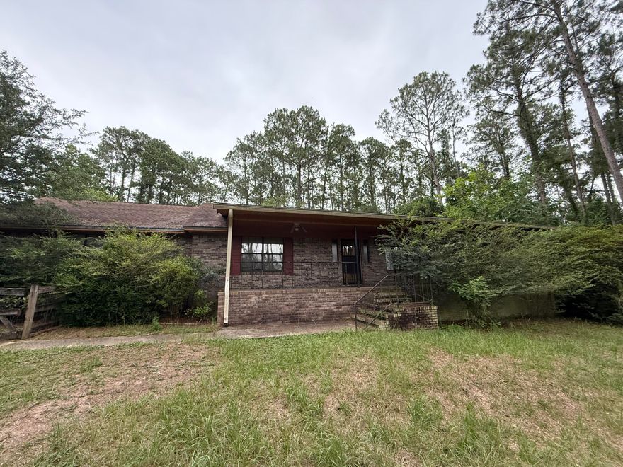 Priced to sell. This home is a investors dream. Home is in need of renovations. This home will not qualify for financing in current condition. This 3 bedroom 3 full bath fully brick home on 2 wooded acres is a property that doesn't come around often.