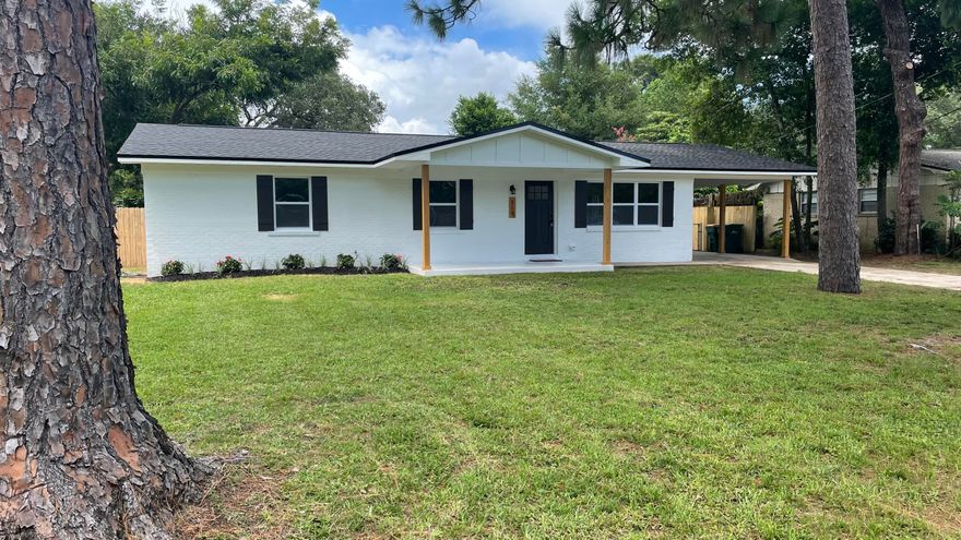 This beautiful freshly renovated home within Colonial Estates is ready to be your families dream home. As you step into the home you're greeted with an open floor plan with an entirely brand new kitchen including a lovely island that makes a great breakfast bar. As you walk through the spacious living room amazing new floors guide you to the back of the house. No stone being left unturned, both bathrooms feature a luxurious update with the master featuring fully tiled in walls. The bedrooms themselves having been updated with carpet to keep that cozy feeling. As you make your way to the big backyard perfect for your favorite pets you'll notice the laundry room eloquently off to the side with its own back door. With this home having all the bells and whistles it certainly won't last long.