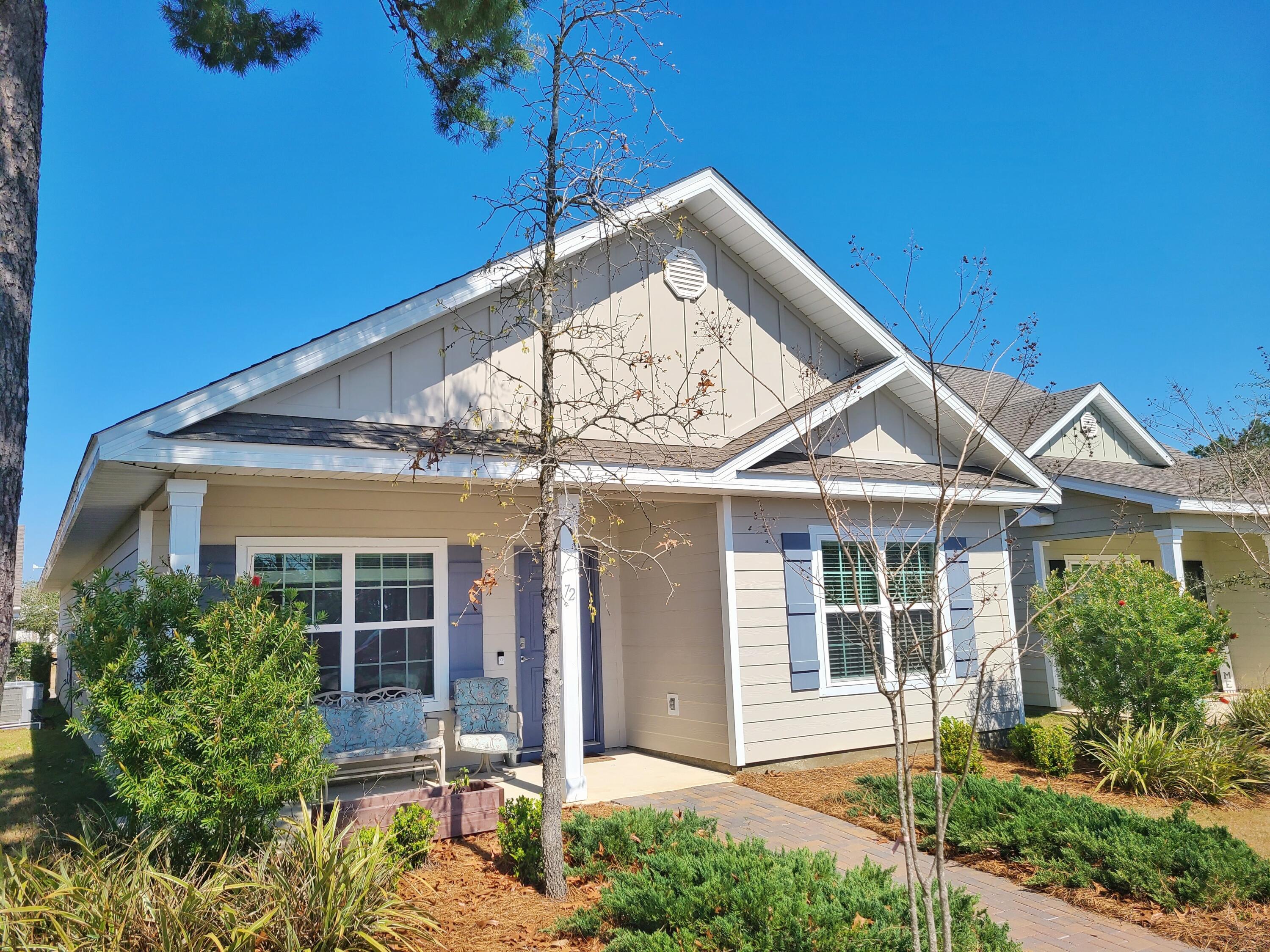 Enjoy the planned community lifestyle of Hammock Bay from this cottage located directly across from the heart of Hammock Bay clubhouse, pools, fitness center, tennis, pickle ball, basketball, and playground. The Porter home plan with open feel and large kitchen island includes 3 bedrooms, 2 bathrooms and a two car garage. Dues include landscaping for the yards, cable TV, & recreational amenities. Hiking and biking trails wind throughout the property and catch and release fishing is allowed at the lakes. You will also find a dog park with dog washing station. Just around the corner, take advantage of the city park, complete with additional playground, soccer and baseball fields. The general store at the town center offers quick snacks and light grocery shopping. See Hammock Bay today.