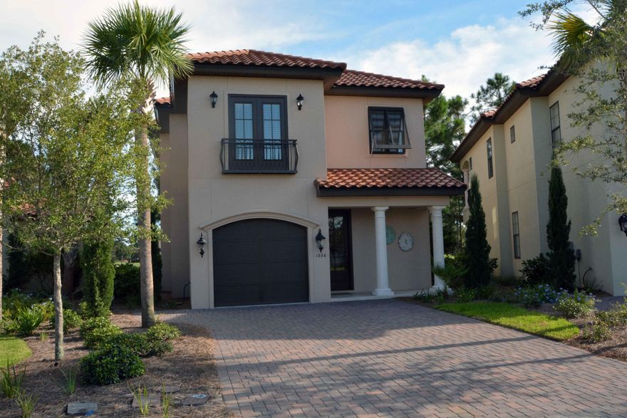 This never rented 4 bedroom, 4 bath home is tucked away in the back corner of Villa Lago and is on one of the largest lots. The large backyard sits on the lake and has AWESOME, EXPANSIVE views overlooking 4 holes of Baytowne Golf Course. The home is perfect for entertaining with an open floor plan, extra large living area, and large covered porch. The kitchen features a large island and bar, stainless steel appliances, including an ice maker, granite countertops and white cabinets. There is a bedroom and full bath on the main level. The home has many EXTRAS such as a larger driveway, golf cart garage, security system and hardwoods throughout. GOLF CART for 4 conveys with the sale. Home is being sold furnished but sellers will negotiate price if buyers prefer unfurnished.