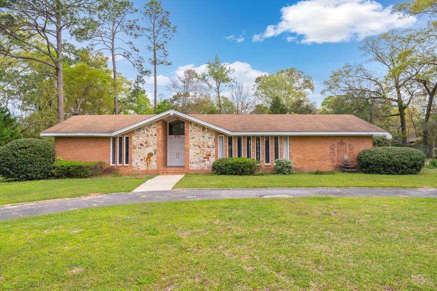 Have you ever heard the saying 'if these walls could talk'? If so you know exactly what I mean by this custom home has many stories to tell. This home has been in the same Family and been loved for many decades by numerous generations of family and friends. It is the home where everyone was always welcome. When standing in the street you can tell right away this is not your standard cookie cutter home. My favorite features include the cobblestone accent around the entry and the large custom windows. Inside the home you will notice the built in book shelf, the curved cobblestone fireplace, 5 bedrooms fit for a large family, and a beautiful back Florida room to name a few. So grab the family, add some personal touches, and get ready to love this home like it has been loved all these years