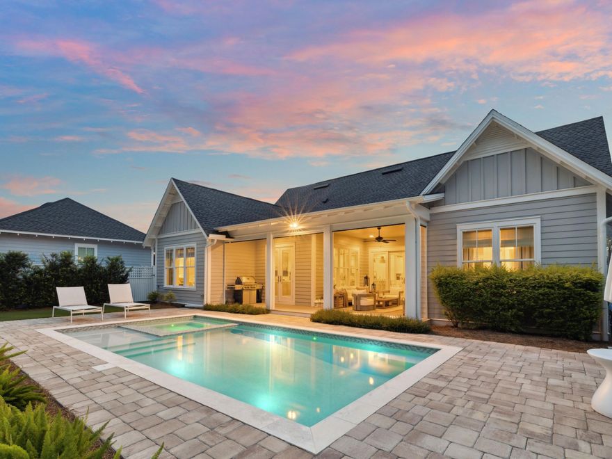 Located on a quiet cul-de-sac in the coveted Greenway phase of Watersound Origins, 43 Rosecourt Street is a stunning single-level home built by Huff Homes, offering the perfect blend of function, privacy, and refined coastal design. The thoughtfully crafted Hawthorne plan features 4 bedrooms, 4.5 baths, and a dedicated office, with a smart layout placing two bedroom suites on each wing of the home for optimal space and comfort. A private courtyard-style driveway leads to the detached two-car garage, connected by a covered breezeway and equipped with high ceilings and pull-down attic storage. Step inside to 10-foot ceilings, custom shiplap details, wide-plank Medallion wood flooring, quartz countertops, and designer finishes throughout. The gourmet kitchen is outfitted with top-tier appliances including a 36" Wolf range, Liebherr refrigerator, Asko dishwasher, microwave drawer, and under-cabinet lighting, creating a true chef's space with timeless appeal.

Glass folding doors open to a spacious covered veranda and beautifully landscaped backyard, where a heated saltwater pool and spa take center stage. Surrounded by lush greenery and enhanced with PebbleTec finish, custom tile, upgraded landscaping, artificial turf, and copper rain chains, this private outdoor retreat is ideal for entertaining or quiet relaxation.

Additional highlights include Phillip Jeffries designer wallpaper, custom motorized screens, 4" plantation shutters, woven lined shades, and upgraded Palacek light fixtures. Every inch of this home has been carefully curated, with designer furnishings available for purchase separately.

Residents of Watersound Origins enjoy access to a suite of world-class amenities including the Village Commons pool, fitness center, tennis and pickleball courts, miles of nature trails, and unlimited golf at The Origins Course. The new Watersound Town Centercomplete with Publix, restaurants, medical offices, and a weekly farmers marketadds unmatched convenience just moments from your door.

This home is a rare find in one of South Walton's most desirable communities, where style, quality, and lifestyle meet.