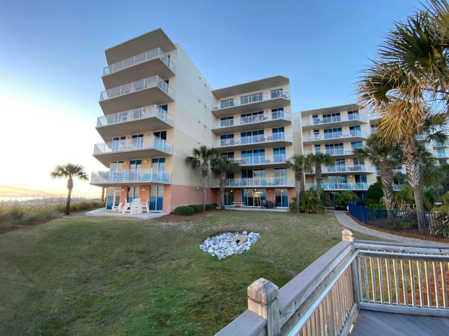 Great ground floor location in one of the best family beach resorts on Okaloosa Island/Ft Walton Beach. 3br/3ba with hallway bunks, sleeps up to 10 comfortably. Walkout of very large gulffront patio direct to the beach access and 490' of dazzling white sand and sparkling emerald green waters of the Gulf of Mexico. Steps away is the relaxing Lazy River, Fuds Tiki hut, zero edge walkin pool, fitness center, 10' waterfall, heated upper pool, kiddie play park, 10 gas grills. Enjoy covered parking, on site mgt. great curb appeal and strong HOA. Unit is fully furnished in neutral decor with leather sofa, MBr and GBR w/ensuite baths, extra 3rd bath w shower; 2K, 1Q, sofabed and hall bunks; room for the whole family and one of the very best rentals in this fun family resort! So much to enjoy!