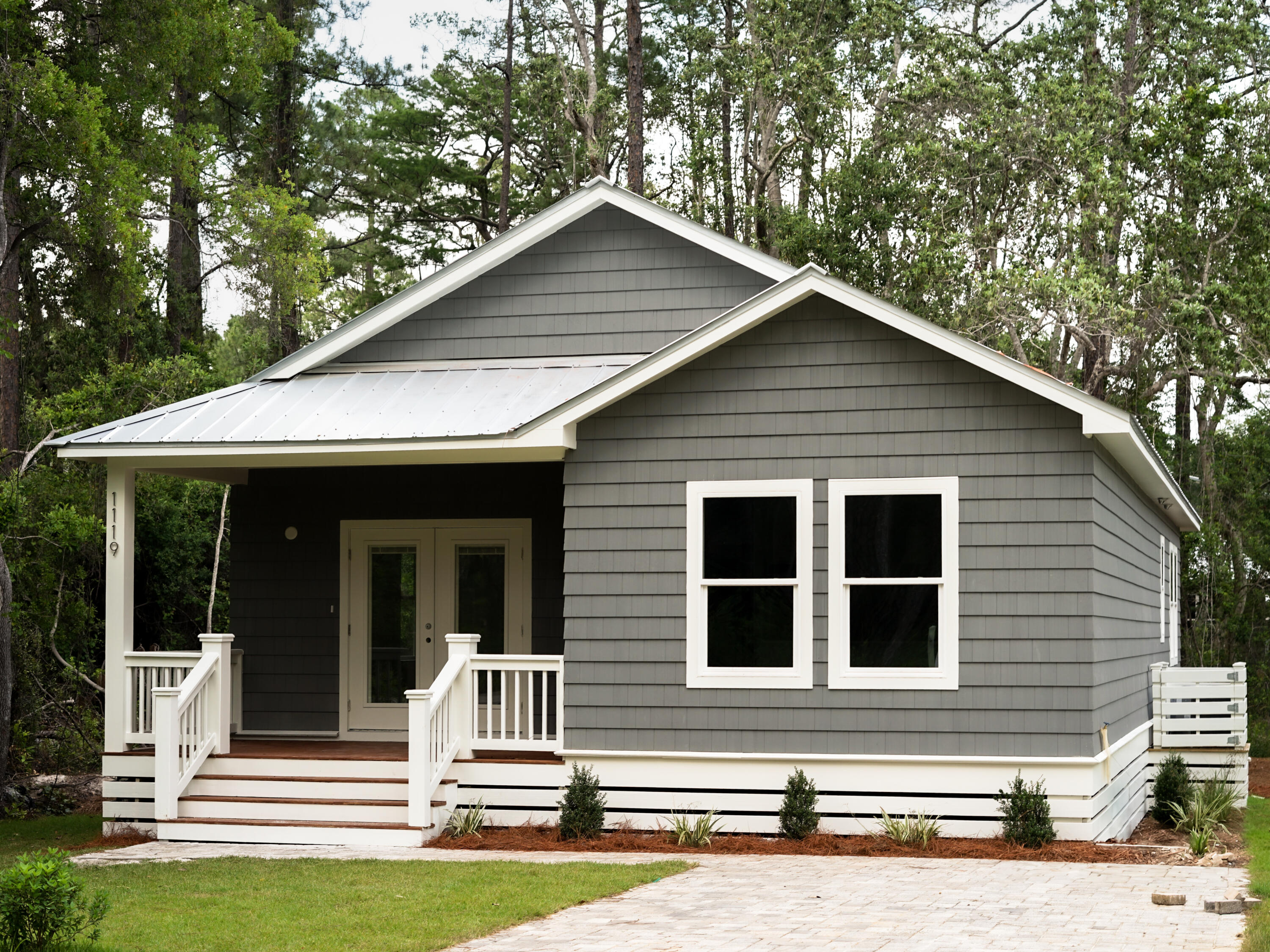 Nestled in the heart of Point Washington, this brand-new, 1450 square foot coastal cottage, built by award-winning Chimar Construction, embodies the quintessential 'Old Florida' charm. Featuring three spacious bedrooms and two luxury bathrooms this home has it all!Step inside to discover an inviting open-concept living space, where natural light spills across durable LVP flooring that extends throughout the home. The gourmet kitchen is a chef's dream, boasting custom cabinetry, high-end appliances, ideal for preparing meals after a day at the beach.Beyond the home, a protected wetlands area provides a tranquil and private backdrop, ensuring a serene connection with nature. Just a short drive away is a public beach access and shopping and dining on charming 30A. All dimensions to be verified by buyer.