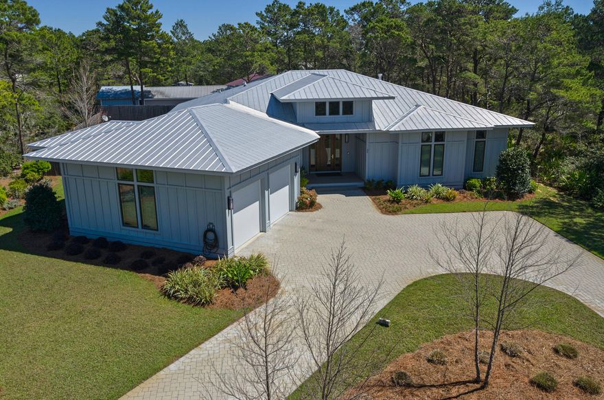 This is not your typical home. So many upgrades to mention here in a limited space so please ask your Realtor to send you a copy of the Detailed Features. This is a beautifully maintained ranch home on a large lot just a short bike ride away from the beach. Contemporary design with a metal roof and hardiboard siding. The kitchen is a gourmet chef's dream with Thermador appliances, pot filler, instant hot water, and custom made cabinets for everything you can imagine. The whole house gas generator means you never have to leave. Close to Gulf Place where you can eat, shop, or just relax listening to music on the green. No HOA fees makes this S. Walton's address to own.