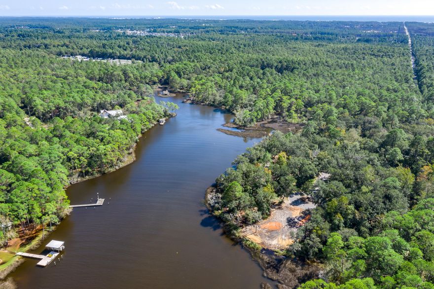 Entered for comp purposes.  Lot 94 is a premium bay front homesite situated on a quiet cul-de-sac on Churchill Bayou. This lot is one of very few in the community that is slated for a potential private dock with boat lift. Tucked away with only native vegetation and the calm waters of Hogtown Bayou in sight, Churchill Oaks offers a lifestyle of elegance and appreciation of nature. Once inside the stately gated entrance, magnificent coastal homes accentuate southern architecture under a canopy of old oak trees. The 40-acre community is comprised of 87 homesites and some of the best amenities South Walton. The latest amenity to the community is a brand-new private deep water marina with 36 private boat slips, paddle board storage decks, a fish cleaning station