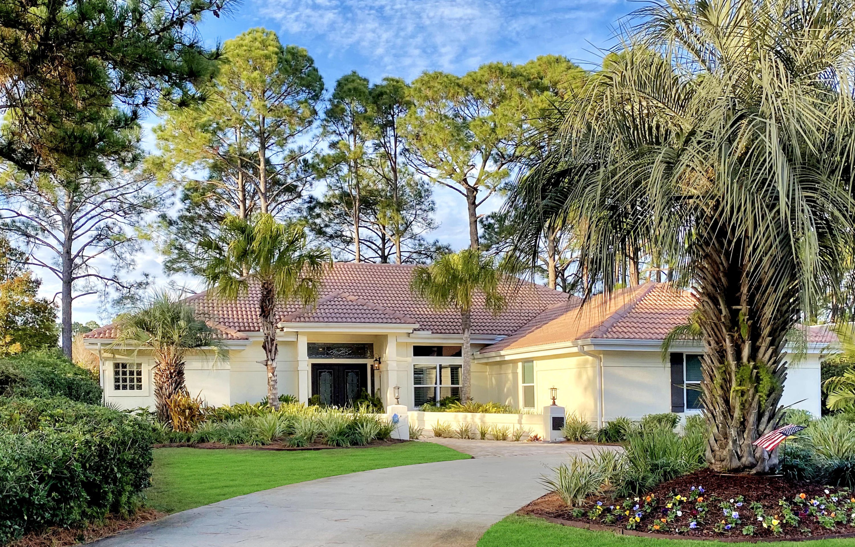 Located in Troon, on the picturesque 18th hole of Robert Trent Jones', Raven Golf Club. This immaculate 3Bedroom with private office, and 4 bath home, sitting on almost a half-acre, is a must see! If you enjoy entertaining, you will fall in love with this incredible open floor plan. The living and dining area open to fenced in backyard, with beautiful views, and plenty of space for a pool. Not to mention the lifestyle that comes along with living inside the private, gated Sandestin Golf and Beach Resort. This entire home has been professionally renovated, with over $170k in updates in the last 4 years! The kitchen features custom cabinets, oversized granite island, beautiful new backsplash, unique stone gas fireplace in kitchen, hand scrapped tobacco wood floors, and all new lighting and fans. Bathroom upgrades include: Master bathroom custom tile - floor to ceiling walk in shower - 7 shower heads. Brand new toilets in all 4, new shower, and jetted tub in the Jack-and-Jill bath. Crown molding, 12ft ceilings, trifold sliding doors in dining room and master bedroom, Family room features custom built-ins. 

New circular driveway, 5-year-old Italian barrel tile roof and lush vegetation. Brick paver walkway and rear patio, surrounded by all new landscaping, Brand new AC, and tankless water heater, along with all new windows. Flood Zone X. Low HOAs, walking/biking trails, close to park, Baytowne, and Grand Blvd restaurants and shops, see the seasonal fireworks from your backyard. Comfortable easy living, golf cart to beach, golfing - close to Raven clubhouse, bay, pool, movies, live entertainment, restaurants, workout center/ Spa, tennis, marina, grocery, and shopping. Call today to see this unique home.
