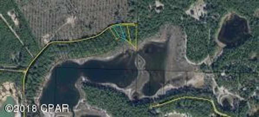 Owner financing is available. Here is a lot priced to sell if you want to live on the lake. Where else can you buy almost 1/4 of an acre lakefront for only $5,000?? All four lots can be bundled for $29,000. All measurements are approximate.