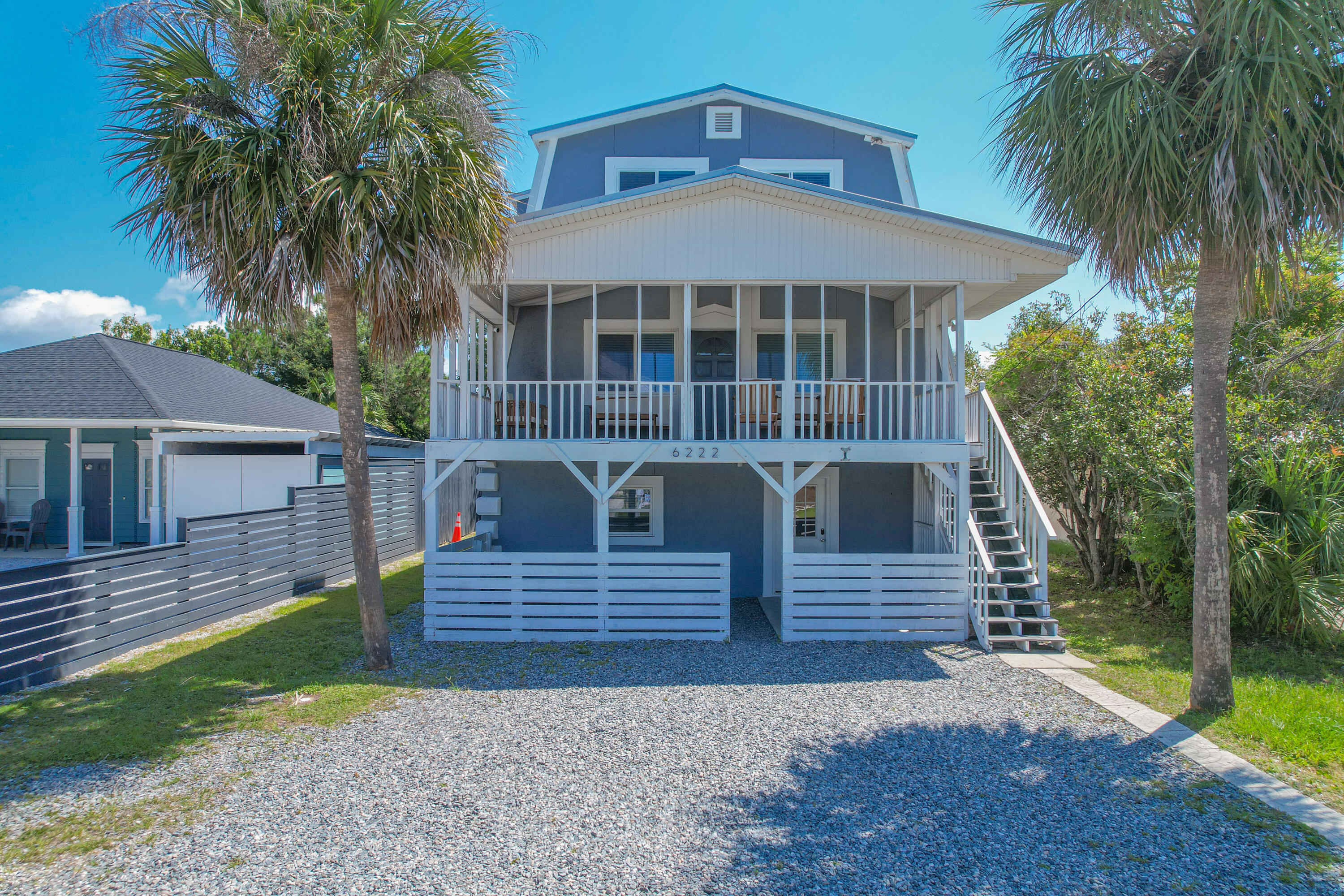 Under Contract-Seller accepting back up offers. Seller will consider Creative Financing and possibly carrying some of down payment. Welcome to this stunning 3-story beach house, ideally located just one block from the picturesque Grand Lagoon and a short walk away from the pristine white sandy beach. This remarkable vacation home has undergone extensive remodeling both inside and out, ensuring a modern and inviting living experience. Can be turned into 2 separate units with a lock out. 2 full kitchens, 2 laundry rooms, 2 living rooms! Featuring a total of 5 bedrooms, 2.5 baths, and two additional bonus rooms, this beach house offers ample space for relaxation and enjoyment.