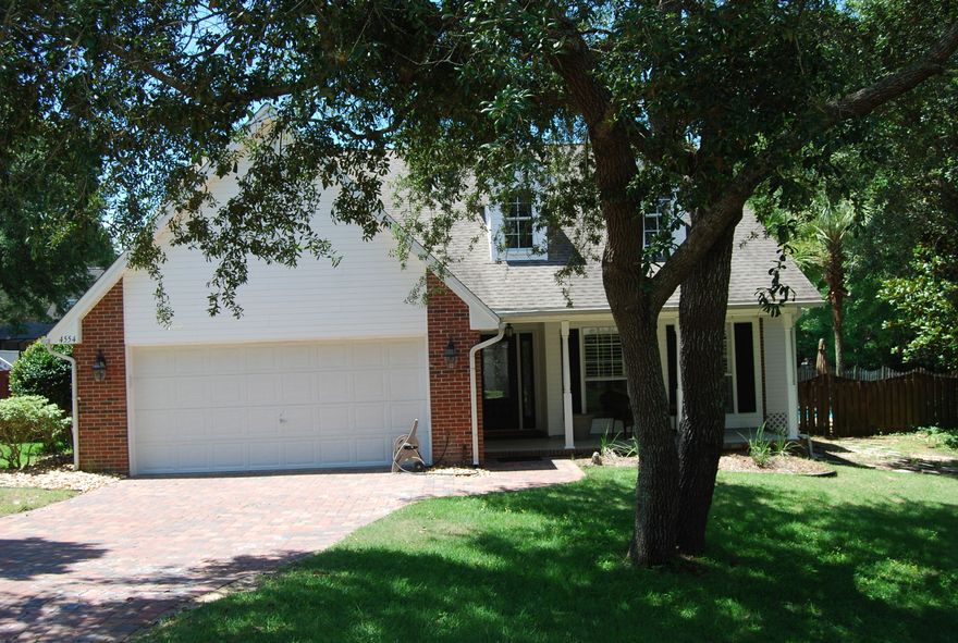 PARKWOOD ESTATES A GATED COMMUNITY: BEAUTIFUL 4 BEDROOM HOME WITH AN IN- GROUND SWIMMING POOL. ALL BRICK HOME FEATURING A NICE OPEN FLOOR PLAN, VAULTED FAMILY ROOM WITH A WOOD BURNING FIRE PLACE, LARGE KITCHEN WITH A CENTER ISLAND, NATURAL GAS RANGE WITH 5 BURNERS, GRANITE COUNTER TOPS AND LOTS OF CABINET SPACE, A BREAKFAST NOOK, FORMAL DINING ROOM, MASTER BEDROOM ON FIRST FLOOR WITH A LARGE WALK IN CLOSET, MASTER BATH HAS BEEN COMPLETELY RENOVATED W/DOUBLE VANITIES, A VERY LARGE SEPARATE SHOWER AND BEAUTIFUL TILE. THERE IS ALSO A HALF BATH DOWNSTAIRS. UPSTARS FEATURES A LARGE LOFT AREA WITH BUILT IN SHELVES AND DESK AREA, 3 GOOD SIZE BEDROOMS, A FULL BATH AND A LAUNDRY ROOM. THERE ARE DOUBLE FRENCH DOOR LEADING FOR THE FAMILY ROOM TO AN OUTDOOR DECK, PRIVACY FENCED BACKYARD AND