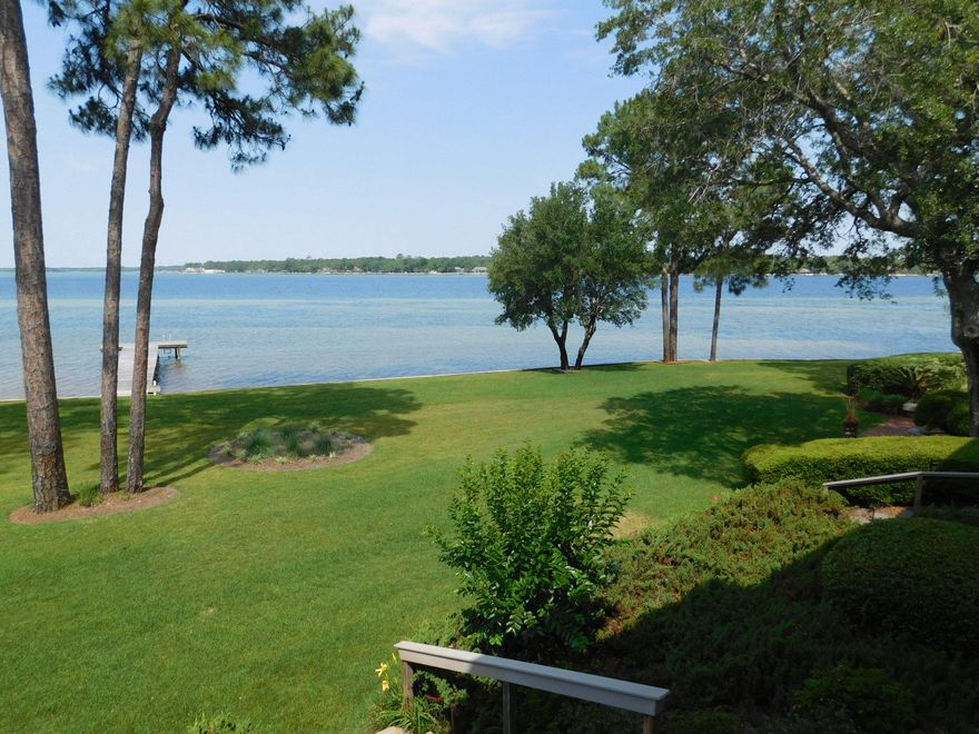 This is a must see condo on the water in Bluewater Bay. It has two bedrooms and two bathrooms. Unit has been almost totally renovated. To include all new cabinets, new countertops in kitchen and master bathroom. Kitchen offers all new backsplash, new pantry, new flooring, new cabinets. Great room/ Dining room has all new pergo flooring. Master bedroom opens onto the back porch that overlooks the incredible views of the Bay. Both bedrooms have new carpet. Bedroom #2 has an all new bathroom. HVAC is 2 years old, and HWH is 2-3 years old. Call today to come and see this great unit on the Bay.