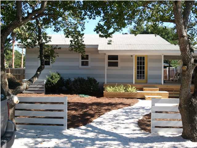 Day or Night you know you're home???. A Completely Remodeled Cottage with 2 Bedroom/2 Bath, approx. 832 sq. ft. with an additional 240 sq. ft. screened outside living room. Wonderful open living room and kitchen with new appliances and granite counter top. The cottage has all new windows and doors, bathrooms with new tile and all light fixtures and floors have been replaced. The attic is boarded for additional storage and outside there is built in storage under the screened living space large enough to safely stow your SUP or other beach toys. They say a picture is worth a thousand words so look at the photos and let them speak to you about this great home. If important the Buyer should verify all measurements. One of Seller?s managing members is FL licensed Realtor. Listing