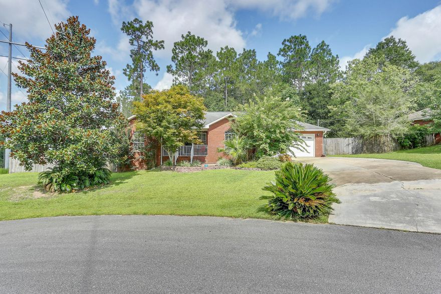 Welcome home. Thia beautiful well maintained 4 bedroom 2 bath home is conveniently located juat north of I-10. Most of the home features new paint and new LVT flooring.Upon entering you will notice the large family room, a welcoming kitchen/dining area, a split floor plan with 4 spacious bedrooms, and a lovely deck in the backyard to enjoy the sunsets. Outdoors include additional space which could be used for RV or boat parking. Come and find peaceful living while being conveniently close to shops, school and transport.