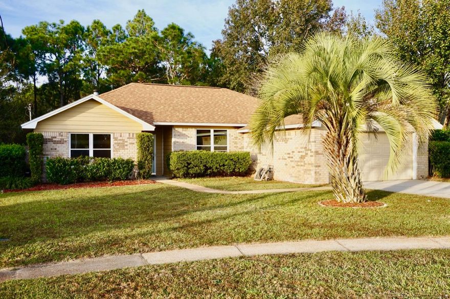 Simply Said....Welcome Home ..Offering an ideal location in East Navarre your 3 bed/2 bath split floor plan home is only 8 miles from Hurlburt field AFB~tucked away in a cul-de-sac,no through road and offers great family living space, home is fenced with a huge back yard and backs onto a wooded area ~just minutes from the beach and local stores. Entering the home, you will appreciate the open flow to the great family room~fully tiled~Focal point fireplace and sliding patio doors to the open back patio~ family room sweeps through to the breakfast nook and kitchen with pantry, large center island~offers lots of cabinet space, soft close drawers~ black appliances and upgraded Granite worktops. Dining area is light and bright and is fully tiled with decorative border tiles ~Large master bedroom is also tiled which flows through to the Master bath with Granite double vanity, step in soaking tub/shower and walk in closets. Additional bedrooms are a good size with large closets and additional bathroom with tub/shower and upgraded Granite vanity. Home has a huge back garden which is fenced ~ mature trees offer shade and privacy with a park like setting & open patio to sit out and enjoy those wonderful Florida evenings...lawn pump and sprinkler system for easy care in the summer months. Inside laundry and 2 car garage with drop down attic stairs. Home has just been fitted with NEW WINDOWS throughout and Fabric Shield storm shutters ~ Trane A/C system was installed in '05. Orion Lake has easy access onto Hwy 98 and offers sidewalks and tree lined streets ~seller is offering a 1 Year home Warranty and can close quickly...If you're looking to be Close to the beach, base and local stores...HERE IT IS ...call today to make an appointment to view.
