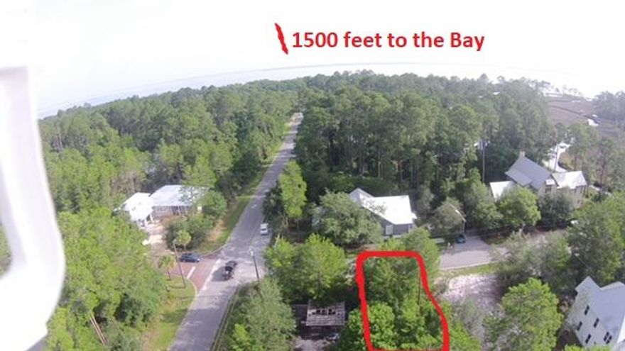 Perfect buildable lot in Magnolia Beach with lots of trees. Level, high and dry ... no wet land issues. Deep water boat ramp just 250 feet East on the bayou leading out to the Bay. Won't last long ... these lots are disappearing with no HOA fees or restrictions.