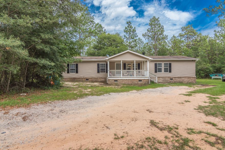 Look no further this country charmer is a must see! This beautiful home was recently renovated in 2018 and move in ready for it's new owners. Your new home comes well equipped with a spacious open concept floor plan with custom two tone wood flooring in the main living areas, a wood burning corner fireplace, split bedroom floor plan with 5 beds/3baths, and you can not forget the chefs dream kitchen featuring new appliances, counter space, and cabinets galore. To top things off your new home will provide plenty of room inside and out for the kids to play and just be kids. You will have slightly over two acres partially wooded for the kids and pets to roam and play. If that doesn't sound like ''HOME'' I don't know what will. Call to schedule your showing today, this great home won't last lon