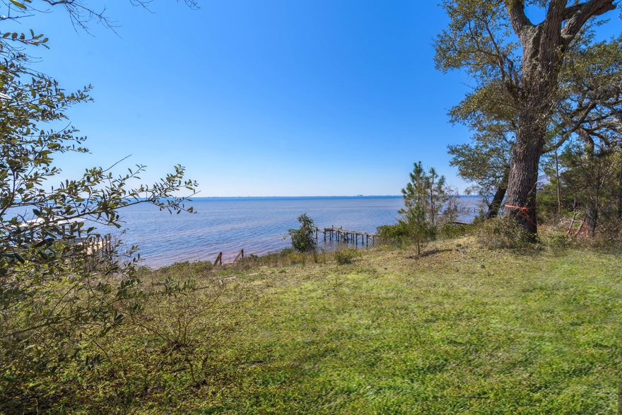 Paradise found! Beautiful tiered property overlooking Choctawhatchee Bay! Fantastic views for creative minds!Gorgeous views of Sandestin, Destin and Mid-Bay! Build the home of your dreams here! Seawall was recently refurbished and rip rap put on shoreline to protect property. This is zoned for VE consturction. This lot will need backfilling to build. Walton County did approve plans in 2019. Perfect for place to park a seasonal RV! Buyer must verify all dimensions and information for lot. All information pulled from public records.