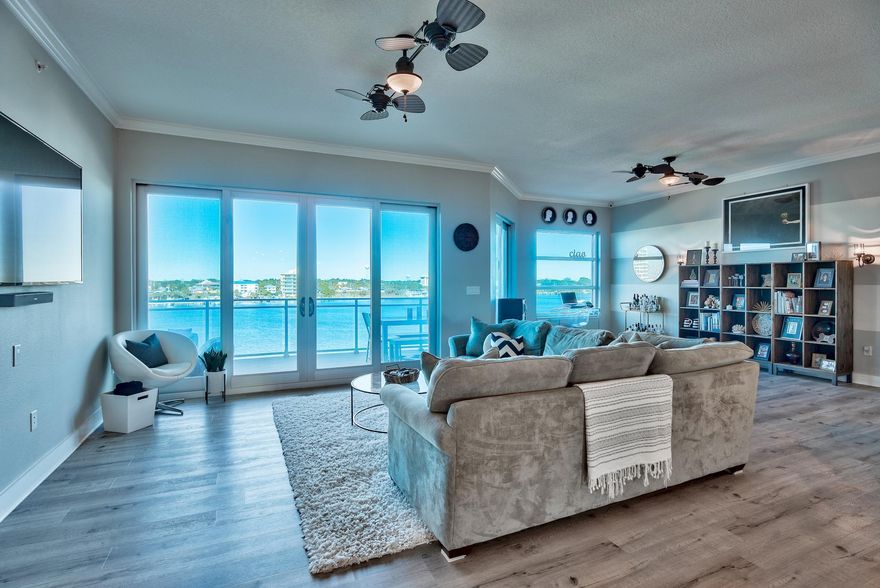 Stunning must see 3-bedroom, 3-bath Harbor front condo at Harbor Lights, a gated, prominent 7-story condominium nestled on the Destin Harbor with incredible amenities and views. This renovated, luxurious unit is being sold fully furnished with contemporary decor. You have an option to purchase a boat slip with lift, private garage space, and a private climate controlled storage unit for an additional expense. This desirable floor plan is the highly coveted middle unit offering two entries - you can conveniently access from both the east and west elevator. There is definite pride of ownership and the property has been impeccably maintained. Upgrades include new flooring & paint throughout, new upscale light fixtures & fans, custom dining room bar, fully updated master bath & wood accents!