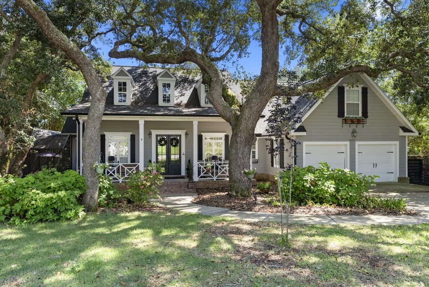 Charming Bungalow Retreat with Ultimate Privacy & Entertaining Spaces!Welcome to 16237 Innerarity Point Rd -- a true hidden gem where coastal charm meets modern updates in a gated community just minutes from Perdido Key! This bungalow-style home oozes character with board and batten accents, bead board, feature walls, bay windows, and a unique blend of textures that make every room feel special.3 Bedrooms Downstairs + Bonus Room Upstairs2 Full Bathrooms and 1 half bath.Surrounded by woods, salt marsh, and total privacy! Special Features & Upgrades You'll Love:

4 outdoor entertaining spaces: a charming bungalow front porch, screened back porch, a full back deck, plus a separate screened-in pool deck with tons of seating, technology, and views  an entertainment paradise!

Cocktail pool for ultimate relaxation.

Open floor plan with vaulted ceilings and natural light pouring through bay windows.

Double ovens and electric cooktop in a chef's kitchen.

Outdoor kitchen area with storage, gas line, and a stylish pergola.

Roof (2017), new hot water heater (3.5 years), and new pool pump for peace of mind.

Additional recent updates: new double front doors, new garage door opener and rollers, new kitchen faucet, new light fixtures throughout.

 More Reasons to Love It:

Surrounded by nature  backs up to a serene salt grass marsh with peek-a-boo water views.

No flood insurance required  one of the highest elevation homes in the area, safely above the floodplain.

Canals nearby connect to the Intracoastal, giving you the ultimate Gulf Coast lifestyle.

Gated community with a neighborhood pool and privacy that's hard to beat.

Whether you're looking for your forever home or a second home retreat, this property delivers charm, privacy, and incredible outdoor living.

Location Perks: Only 5 minutes from Perdido Key beaches, close to shopping, dining, and everything coastal living offers.

Ready to experience Innerarity Island living? Schedule your private tour today!
