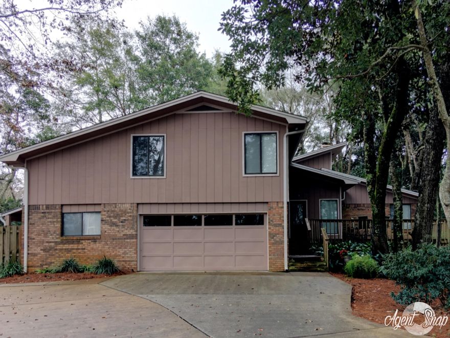 Beautifully maintained and updated 3 bedroom, 2.5 bath home in Niceville. This home features several decks including the large, front deck (with water views) leading to the entry. On the main level, you'll find a spacious living room w/ a very high ceiling, curved brick wall features and a gas fireplace. You'll love the gorgeous, huge kitchen with lots of updated cabinetry, gas 5 burner stove, stainless steel appliances, granite countertops and an extra veggie sink. Just off the kitchen you'll find a spacious breakfast nook and beyond that, a dining area. One of the decks is just off the breakfast nook and this leads to the backyard. Also off of the kitchen is a nice sized laundry/utility room with storage. From the laundry room, and downstairs, there is a great bonus room perfect for a