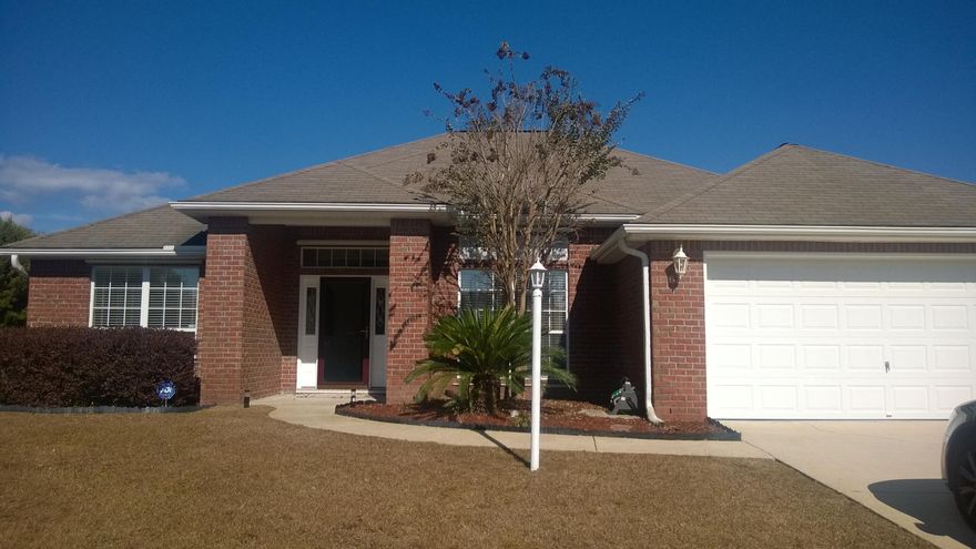 Great four bedroom two bath, new paint and carpet 10 foot ceilings fireplace fenced yard as well as shed. just five miles from hulburt field