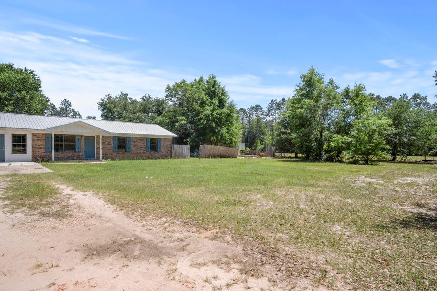 LOCATION, LOCATION, LOCATION, If you are seeking privacy this is the perfect home for you.This is going to be a fun fixer upper. This Brick Home sits on almost an acre of land, The home offers 4 bedrooms 1.5 Bathrooms with Ceramic tiles throughout the main areas of the home with New Carpet in the Bedrooms. The kitchen offers New white shaker Cabinets. The bathrooms offers new sink cabinets, the main bathroom has been remodeled too. Another beautiful feature is that it borders the Blackwater River State Forest and is only 2 miles from the park itself, if you're seeking for a home with almost an acre of land and a nature seeker this home is for you. Property is being sold AS-IS. Seller has never occupied the property. Home is on a combo lockbox.