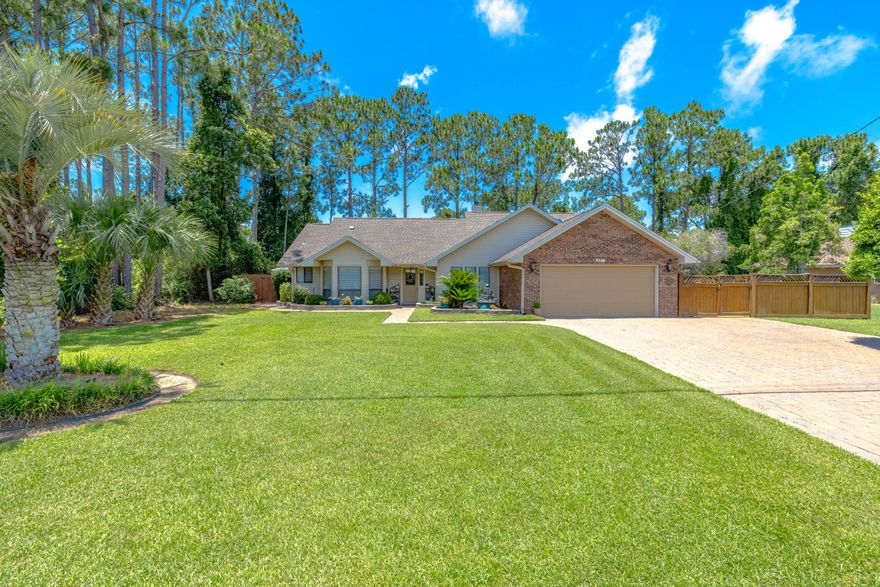 This property is located in the Colony Club community . It is a beautiful golf course neighborhood with no HOA !No flood insurance required on this flood X home.The huge backyard with outside storage building allows you to feel like you live in absolute serene nature while sitting on your screened in porch. Large two car garage, with plenty of parking with a double gate to the fenced in yard.It is a quick drive to the beach .This home also offers top-of-the-line kitchen appliances with a double dishwasher , leathered granite countertops , a wall oven, microwave convection oven combo, and  tankless gas water heater.  the primary bathroom you will be blown away by the size and elegance of this amazing bathroom.live close to the entrance to Gayle's trail .Come See Toda